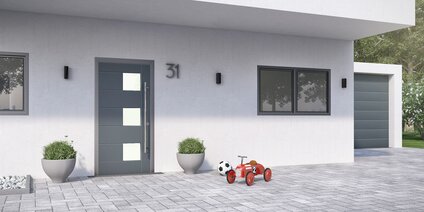 Mehrfachverriegelungen zur Nachrüstung Moderner Hauseingang mit Pflanzgefäßen Hauseingangstür mit Mehrfachverriegelung
